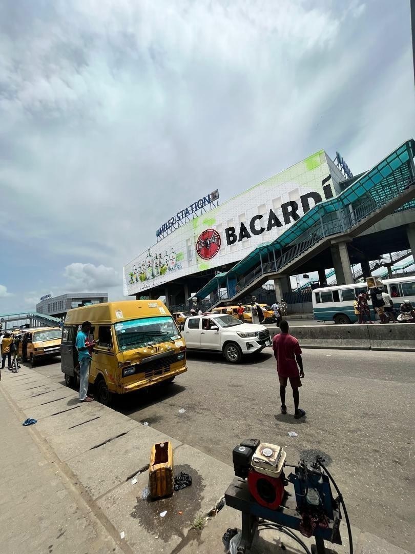 Mesh drape on station buildings, Festac and Marina routes — Mesh drape, Mile 2 Station